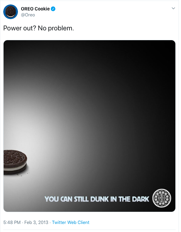 Oreo lit up with darkness surrounding it and the words "You can still dunk in the dark" on it. 